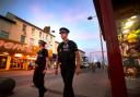 Clash - police officers on patrol outside Gaiety Amusements in Clacton