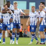 Team effort - Colchester United's players are looking to move up the League Two table with some positive results