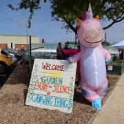 The inflatable pink unicorn welcomed visitors