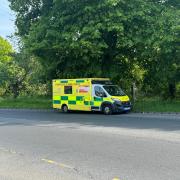 Scene - an ambulance in Cowdray Avenue on Saturday afternoon