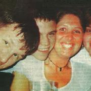 Julian Dykes, far left, John Light, second left, and Andrea Dykes, who were caught in the blast.