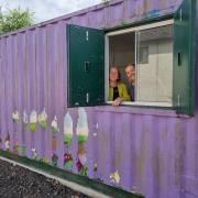 Great plans - Cllr Andrea Luxford Vaughn and Anne Lucking inside the youth hub container.