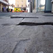 Dangerous - a raised paving slab in Culver Street West