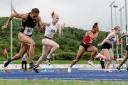 Pace - Colchester's Rebecca Jeggo (white vest, number 55) competes at the Welsh Senior and U15 Athletics Championships at the Cardiff International Sports Campus Picture: JOHN SMITH