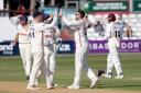 Breakthrough - Essex spinner Simon Harmer celebrates taking a wicket against Somerset with his team-mates