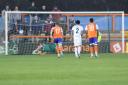 Penalty hero: Braintree Town Jack Sims saves Ross Stearn’s spot-kick against Taunton Town.