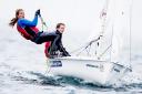 Golden girls - Saskia Clark (left) and Hannah Mills claimed gold at the Sailing World Cup in Weymouth. Picture: Pedro Martinez/Sailing Energy