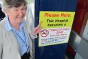 Warning - trust managing director Barbara Buckley with one of the signs