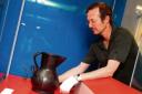 On show – the museum’s Steve Yates with the Wenlock Jug