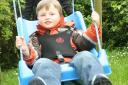 Charlie Foxley, who loves to play on the swing, but has to have a specially adapted one.