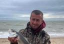 Key catch: Mark Oxley with the bass that helped him win the latest Colchester Sea Angling Club match.