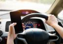 Drivers will face tougher rules when using mobile phones at the wheel