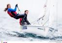 Golden girls - Saskia Clark (left) and Hannah Mills claimed gold at the Sailing World Cup in Weymouth. Picture: Pedro Martinez/Sailing Energy