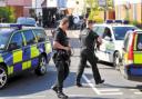 Scene - armed officers in Mill Road. Picture: Gazette reader DAVID YATES