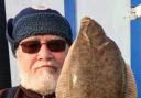 Prize-winning catch: Colchester Sea Angling Club member Bill Paqutte with his winning flounder, caught during the match at Holland-on-Sea.
