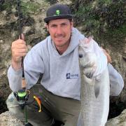 Success - Jon Hall seems to have a knack of catching bass on lures from the local beaches and this one is his biggest from his last trip