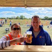 Cheers - Owners Emily and Guy French enjoying a drink at the pumpkin patch bar.