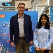 Winner – Pritika Maheshwari receives her prize from Councillor Martin Goss at the Leisure World