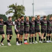 Respect - Colchester Rugby Club's players take part in a minute’s applause for senior rugby chairman Jon Smith, who died last week