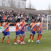 Team effort: Aaron Blair celebrates with his Braintree Town team-mates after scoring against Slough Town.