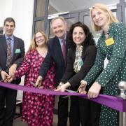 Ribbon - (L-R) Vice-Chancellor Professor Anthony Forster cut the ribbon to mark the official launch with Dean Professor Victoria Joffe, Dean Professor David O'Mahony, IPHW Director Professor Mariachiara, and Emma Blowers