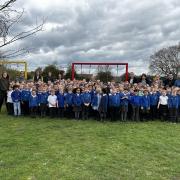 Smiles - pupils and staff at Broomgrove Infant School celebrate its new Ofsted report