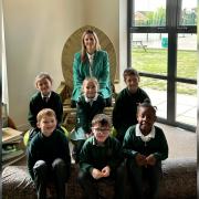 Happy - headteacher Hannah McCann pictured with Gosbecks pupils