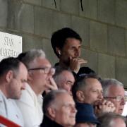 Vantage point - Colchester United head coach Danny Cowley watches his side's game at Crawley Town from the stands