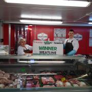 Winners - Meatline staff and the winner's banner