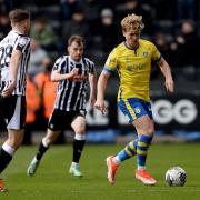 On the ball - Cameron McGeehan in midfield action during Colchester United's game at Notts County