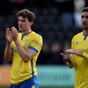 Thanks - Riley Harbottle (left) and Ellis Iandolo applaud the Colchester United fans following their 1-0 defeat at Notts County