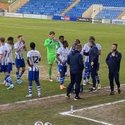 Tactics - Colchester United under-21s get a team talk from coach Liam Bailey during their game against Watford