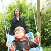 Charlie Foxley, who loves to play on the swing, but has to have a specially adapted one.
