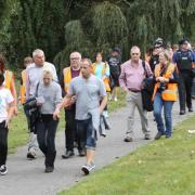 Colchester community holds walk in memory of Jim and Nahid