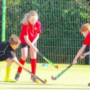 Cross sticks - Ardleigh (black and yellow kit) take on Great Oakley at the hockey tournament staged in Dovercourt. Picture: SEANA HUGHES (CO104476-20)