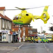 Take-off - the air ambulance lifts off from Church Road, Tiptree, after the crash between three cars and a cyclist. Picture: GAZETTE READER DAVID JOHNSON