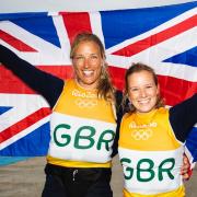 All smiles - Saskia Clark (left) and Hannah Mills are on the verge of clinching Women's 470 gold at the Rio Olympics. Picture: Richard Langdon / British Sailing Team