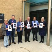 Generous - Pauline Wilkinson, league chairman Frank Jordan, volunteer Carol Hirons, John Akker, Cancer Centre Campaign committee member, Dr Mukesh, and Beverley Pickett, Macmillan Lead Cancer Nurse, outside the site of the new cancer centre