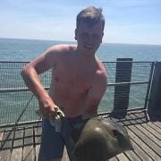 Ray success - Lee Grego with a stingray caught from Walton Pier. The bait was squid and ragworm