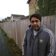 Trey Khan involved in a dispute over his fence at his home in Layer