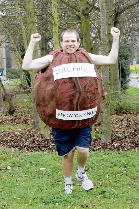 Trevor Fulcher, 41, of Skelton Close, Lawford, is running dressed as a giant nut for Orchid Cancer Care. Sponsor him at virginmoneygiving.com