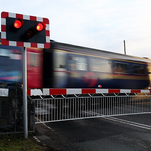 Road is reportedly closed due to a faulty railroad crossing