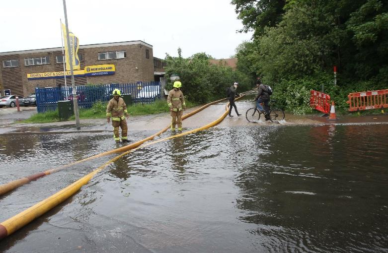 Crews pumping water from Haven Road