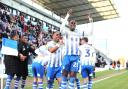 Cheer - Jay Mingi celebrates after scoring a dramatic stoppage-time winner for Colchester United against Newport County, in March