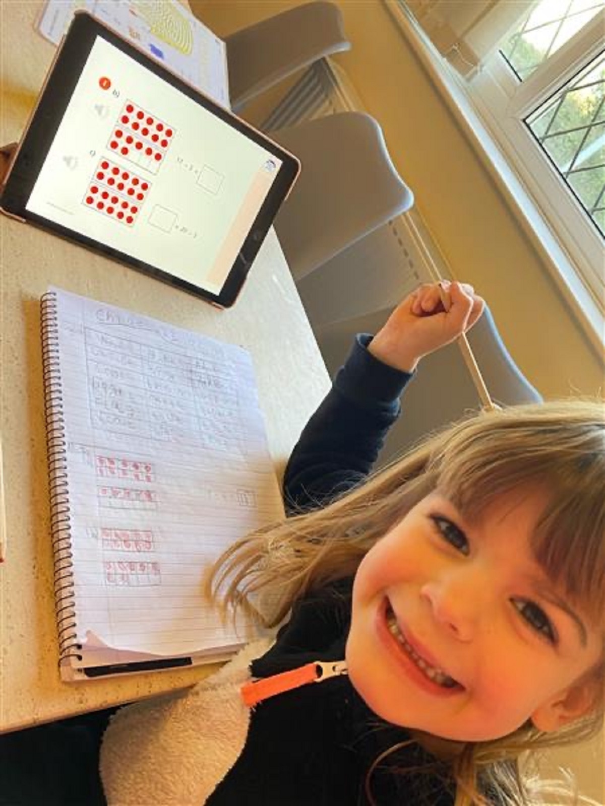 Number crunching - Chloe Kirton, working on her maths using tens frames