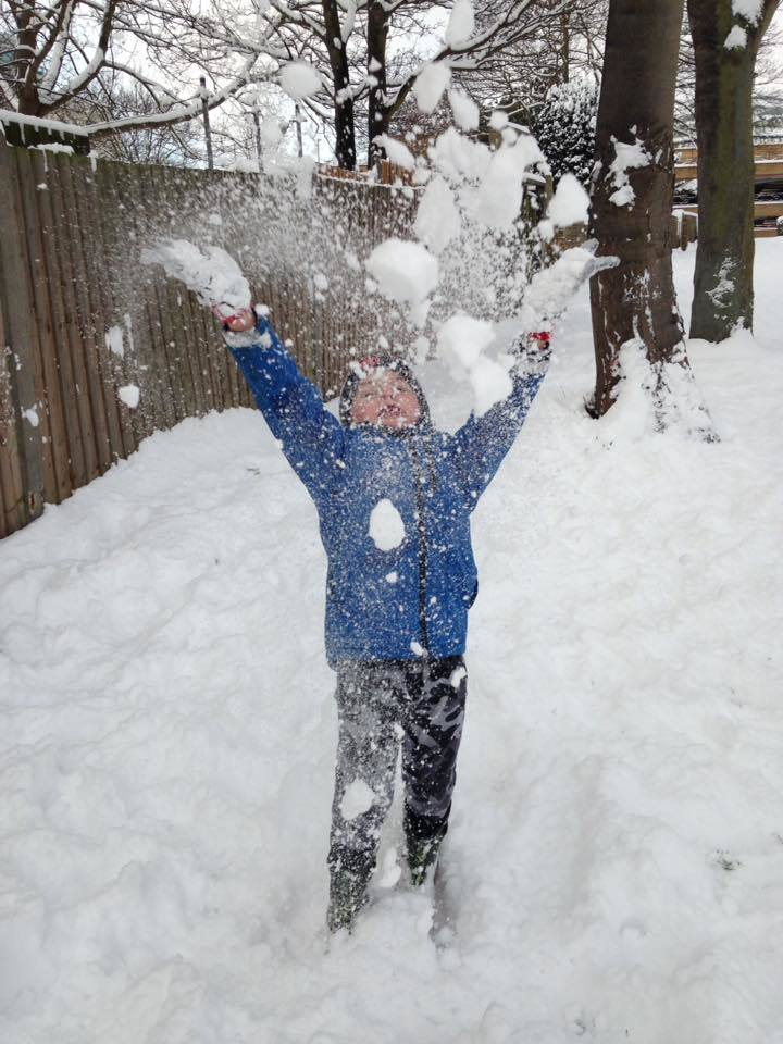 Fun - Harry Mcdonald, 7, plays in the snow