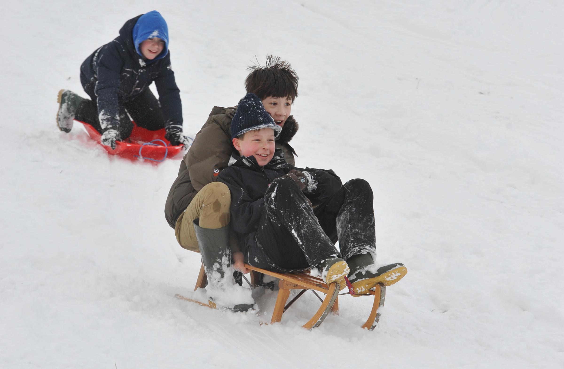 Colchester in the snow..Castle Park Hari Yong, 12, with Elliott Stevenson, 11..