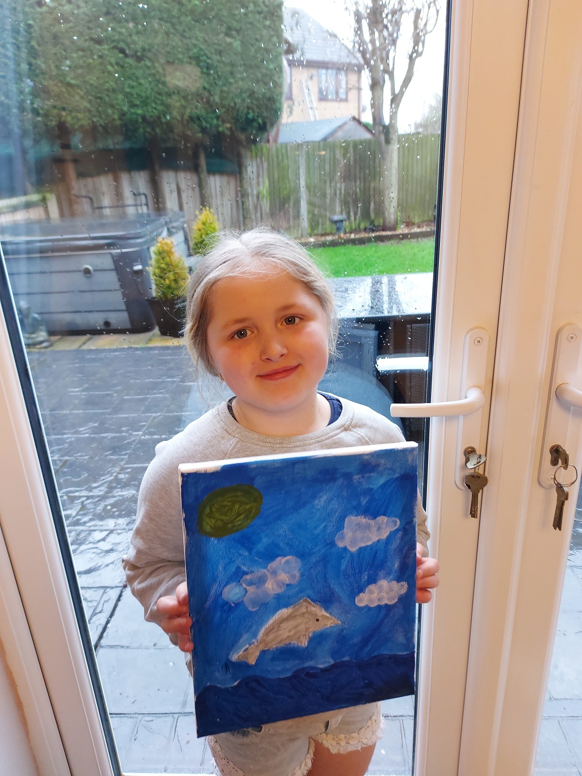 Graceful - Sophie Robertson, seven, painted a dolphin leaping from the water
