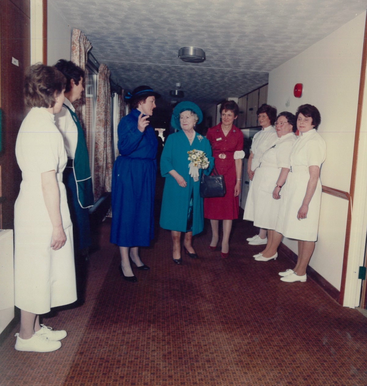 Official unveiling - Dr Elizabeth Hall, one of the hospice’s founders and then first medical director, gives the Queen Mother a tour of the new hospice and introduces some of the nurses during the official opening in April 1986