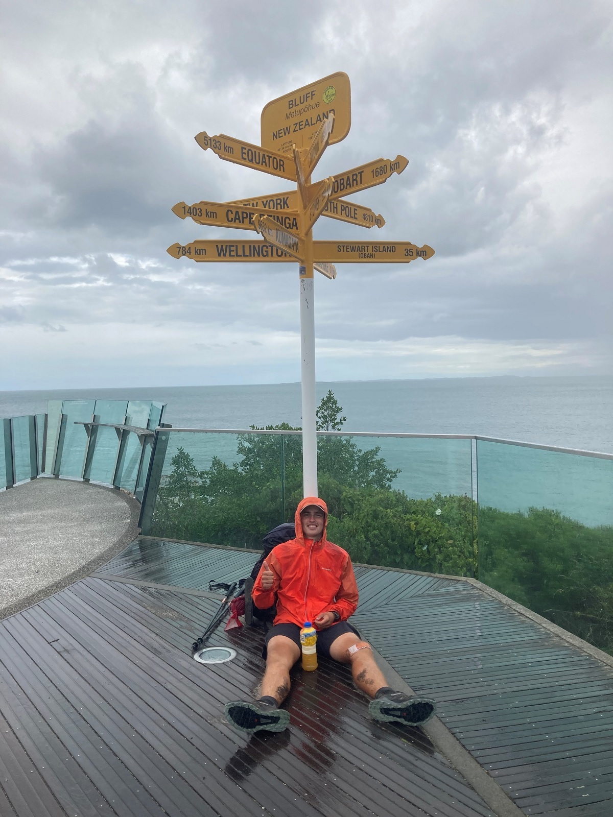Mission accomplished - Shay Broomhall at the Bluff signpost